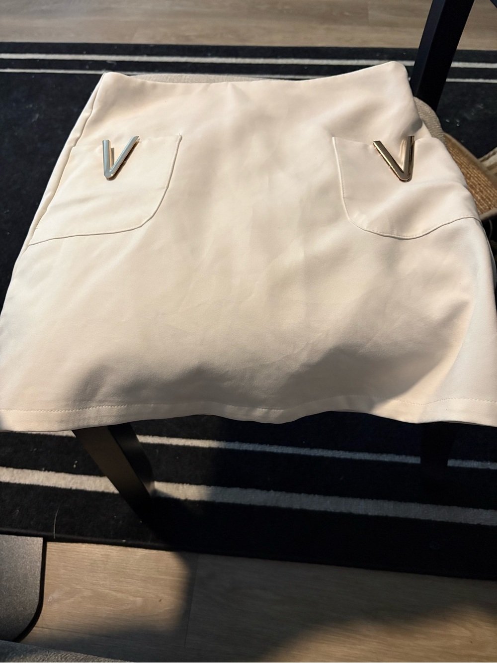 Cream Mini Skirt with Gold V Pocket Accents